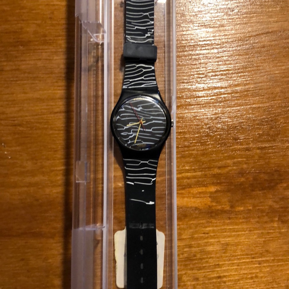 Swatch watch with case